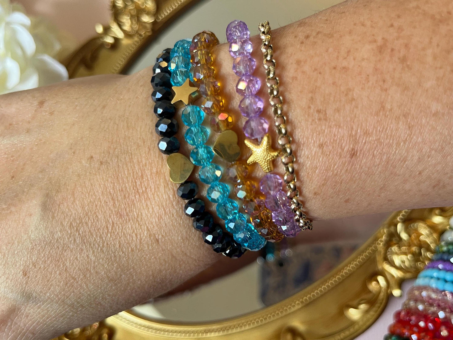 Glitzerarmband, Freundschaftsarmband, funkelndes Armband aus Facettperlen in Hellblau mit goldenem Seestern - Laury goes Sardinia